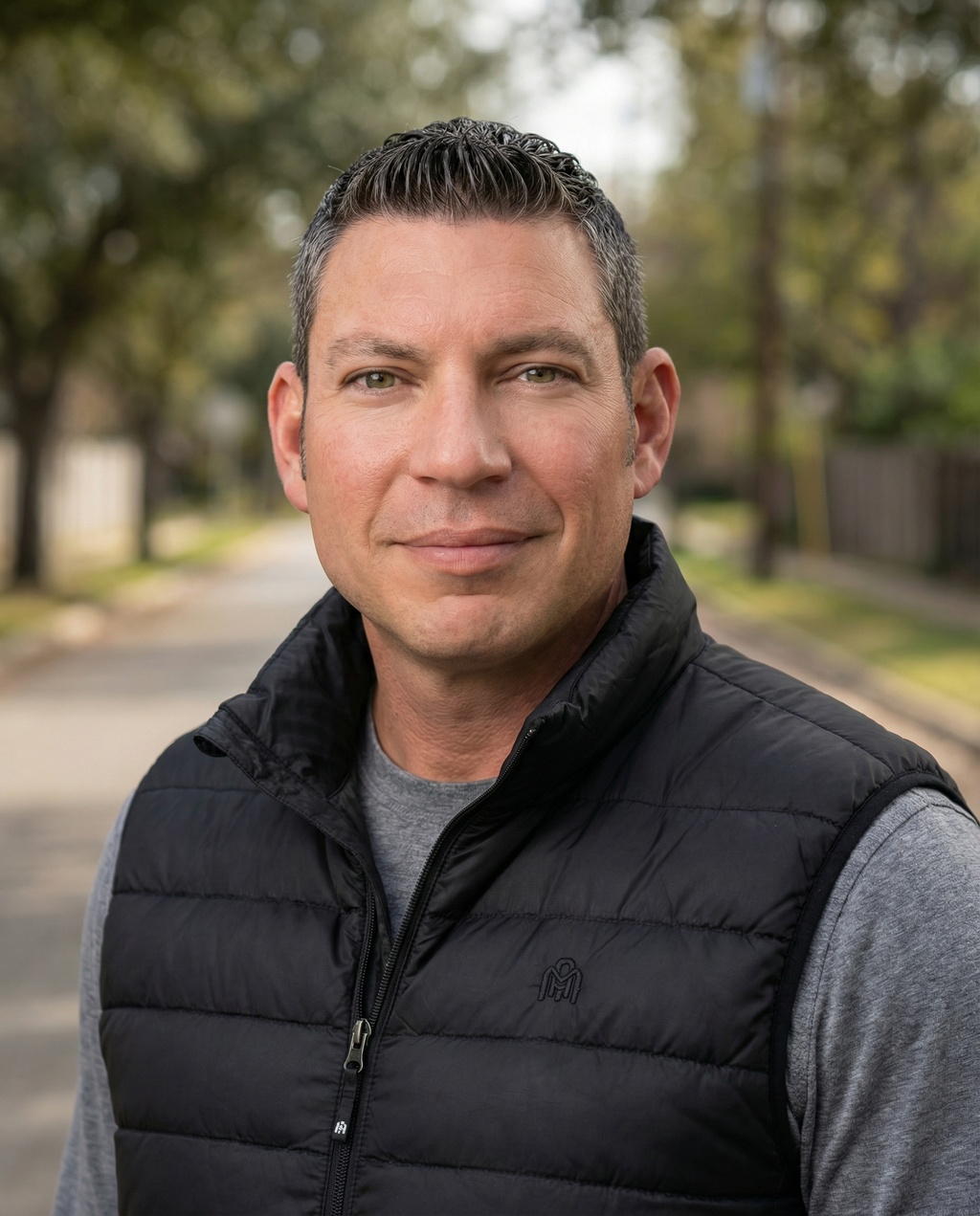 A real estate team member's corporate headshot, rendered in the same matching style as the rest of the set