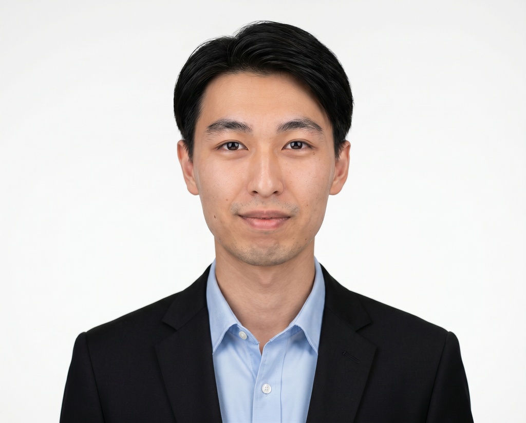 Example corporate headshot 7 of 8 in the White studio style, same backdrop as the rest of the team